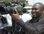 News cameraman, Takoradi, Ghana